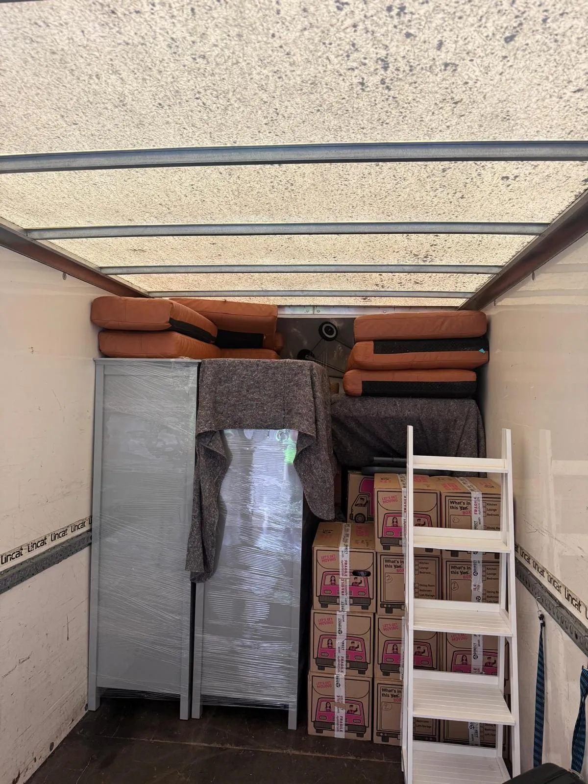 Removal van parked carefully on a residential street